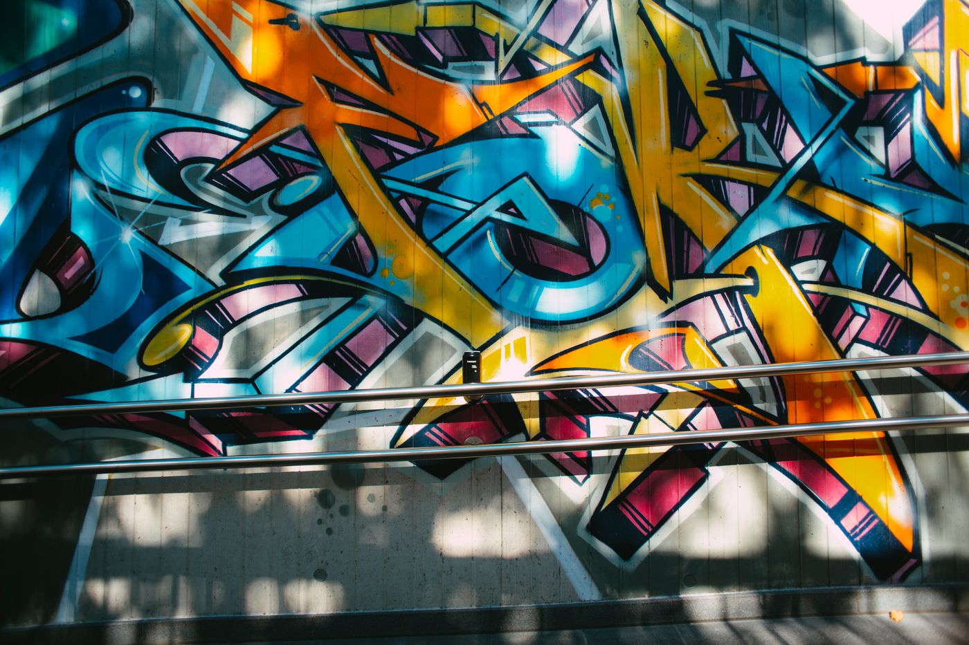 Colourful street art on an urban wall